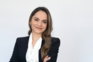 a woman in a black suit